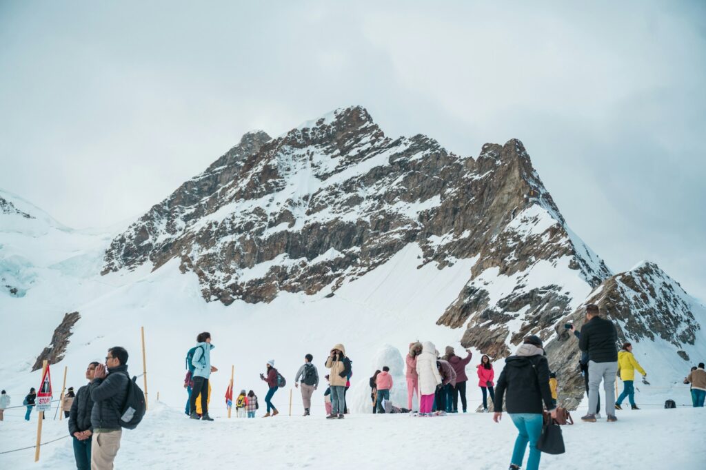 a group of people on a snowy mountain
